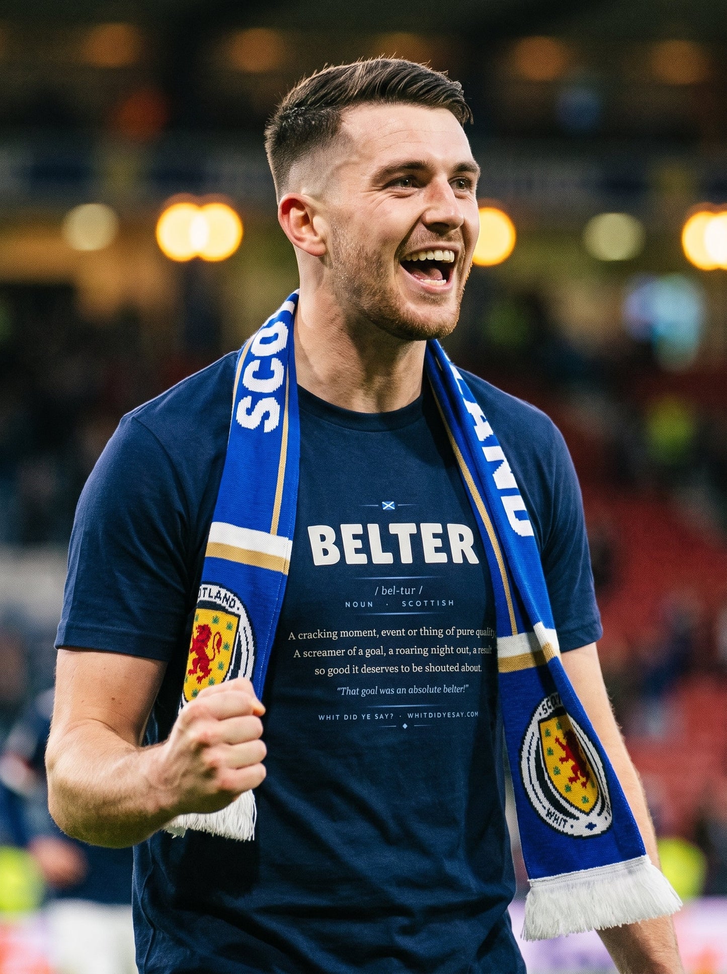 Football fan in a Scotland scarf wearing the navy BELTER dictionary definition tee