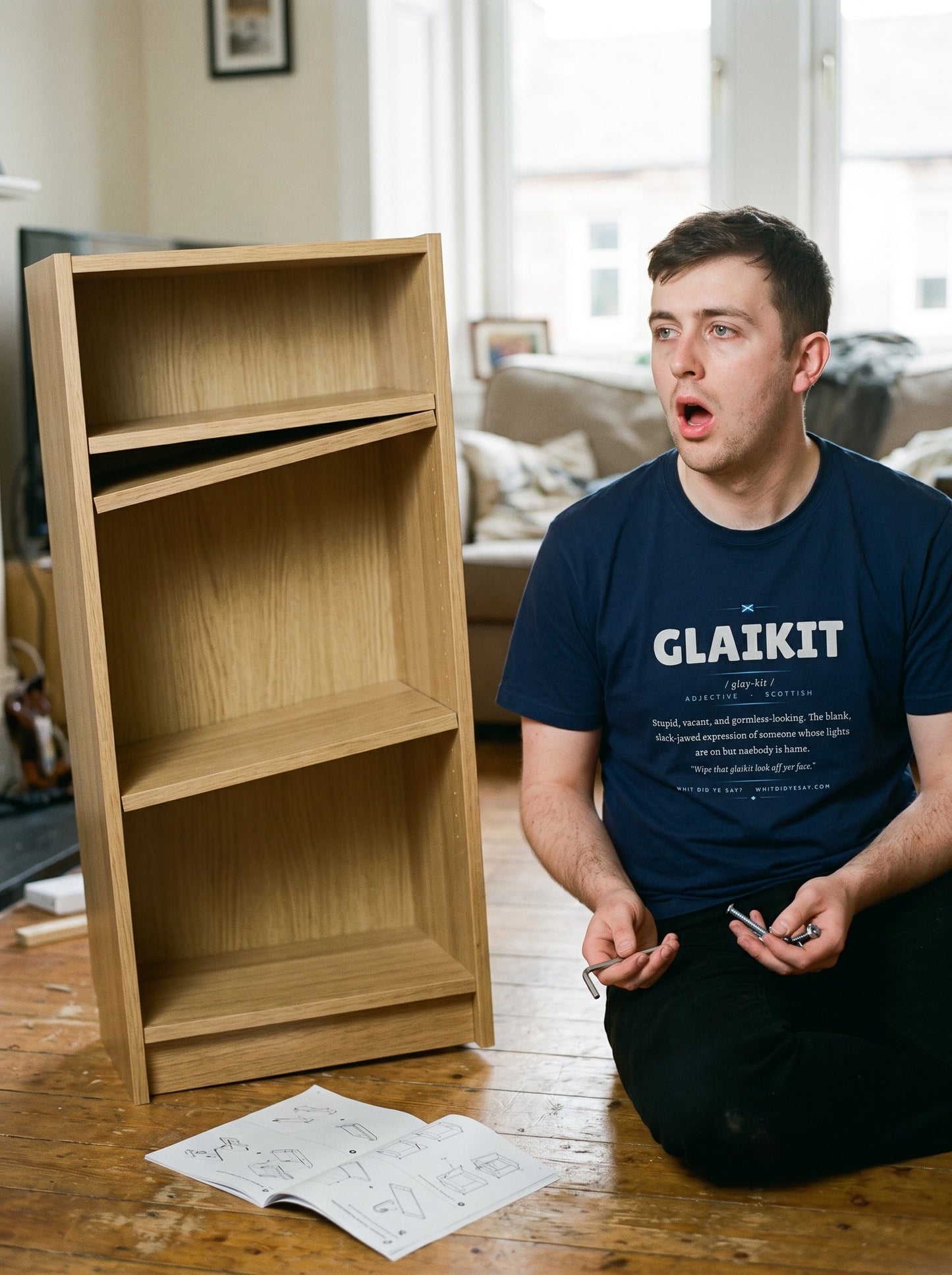 Person wearing the navy GLAIKIT dictionary definition tee