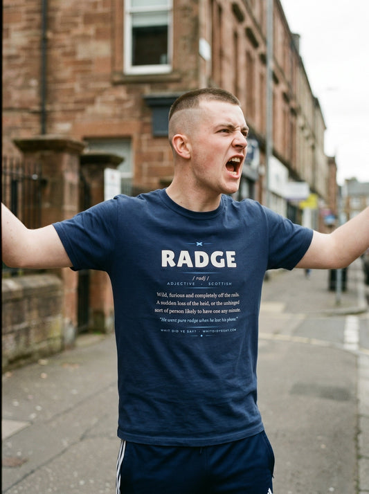 Person wearing the navy RADGE dictionary definition tee