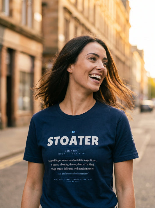 Person wearing the navy STOATER dictionary definition tee